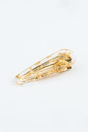The triangular clear gold clip